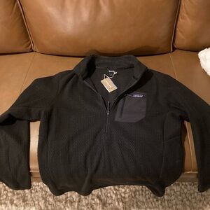 Patagonia black half zip sweater - size L
